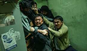 Joe Taslim and Xie Miao push back a crowd of bad guys in The Furious