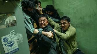 Joe Taslim and Xie Miao push back a crowd of bad guys in The Furious
