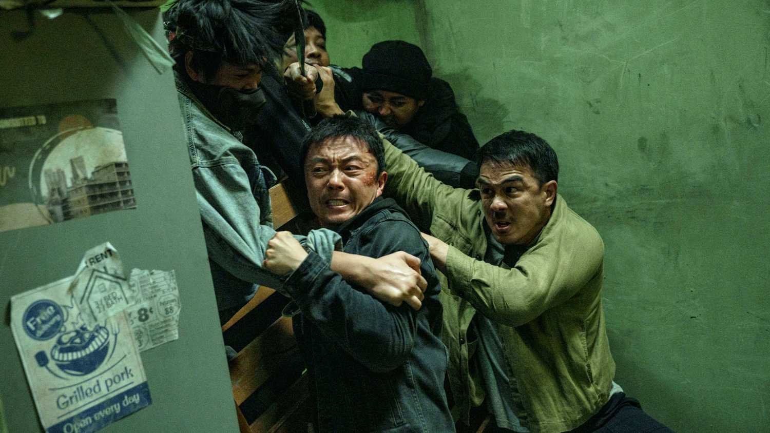 Joe Taslim and Xie Miao push back a crowd of bad guys in The Furious