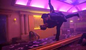 Joe Taslim throws a guy into a table in The Furious