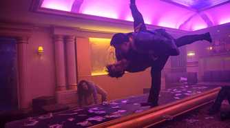 Joe Taslim throws a guy into a table in The Furious