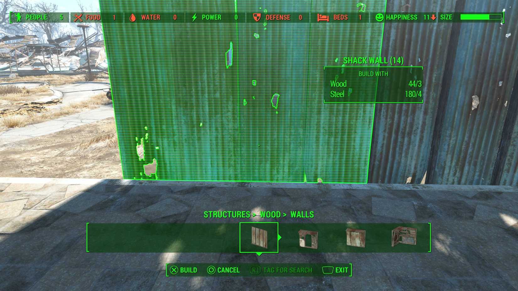A closeup of the base building process in Fallout 4, with a wall about to be placed against a foundation