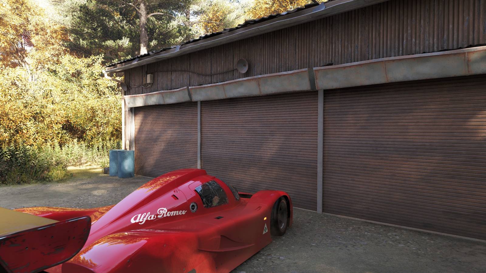 An Alpha Romero in front of a barn in Forza Horizon 6