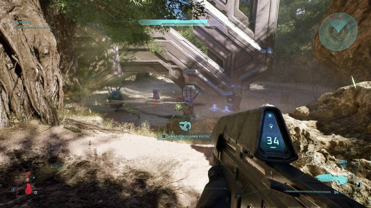 The player wielding an assault rifle in Halo: Campaign Evolved and aiming at two hunters on The Silent Cartographer level