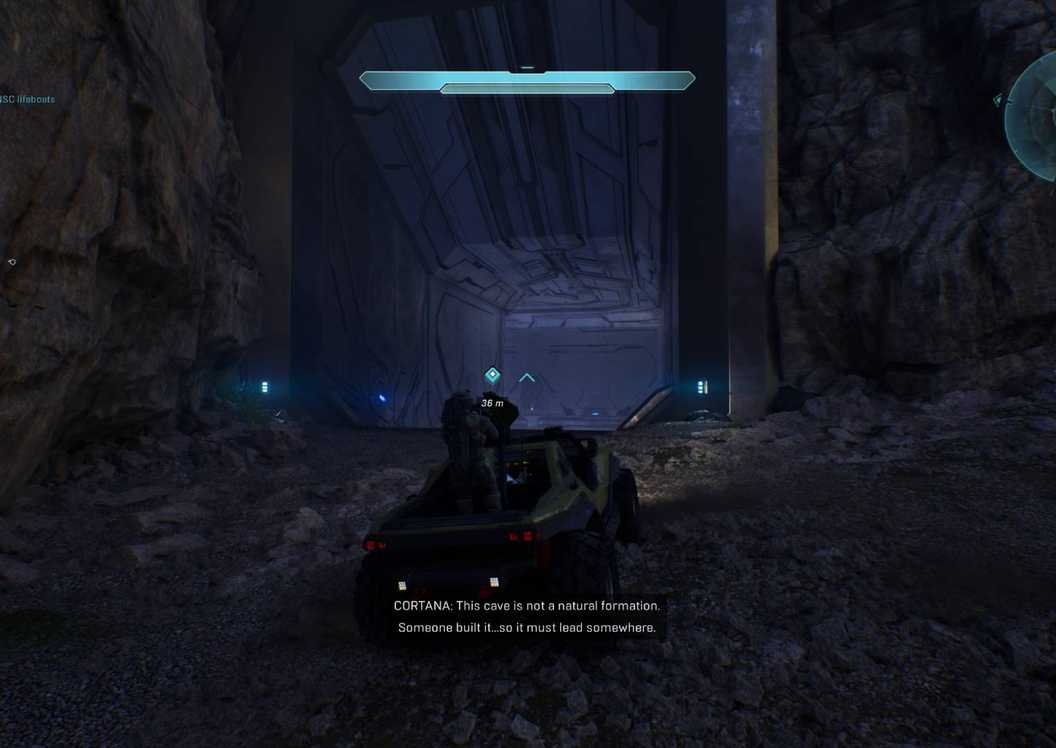 Master Chief driving the warthog into the unnatural cave formation in Halo in Halo Campaign Evolved