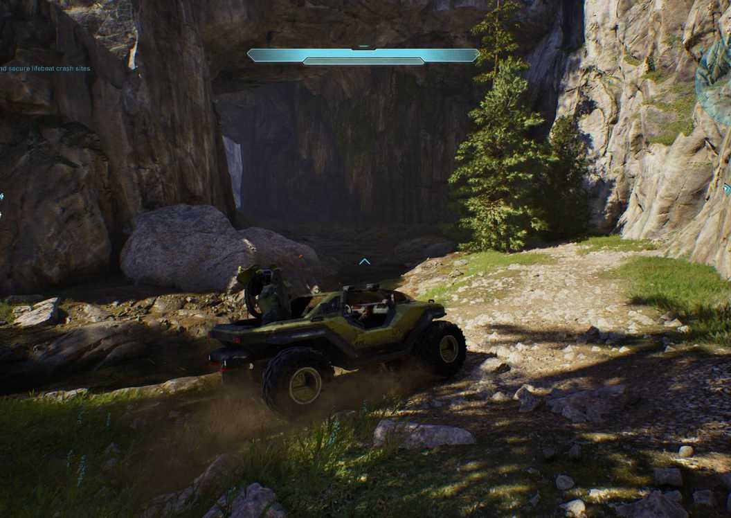 Master Chief in a warthog at the foot of the stream leading to the Give & Take skull in Halo Campaign Evolved
