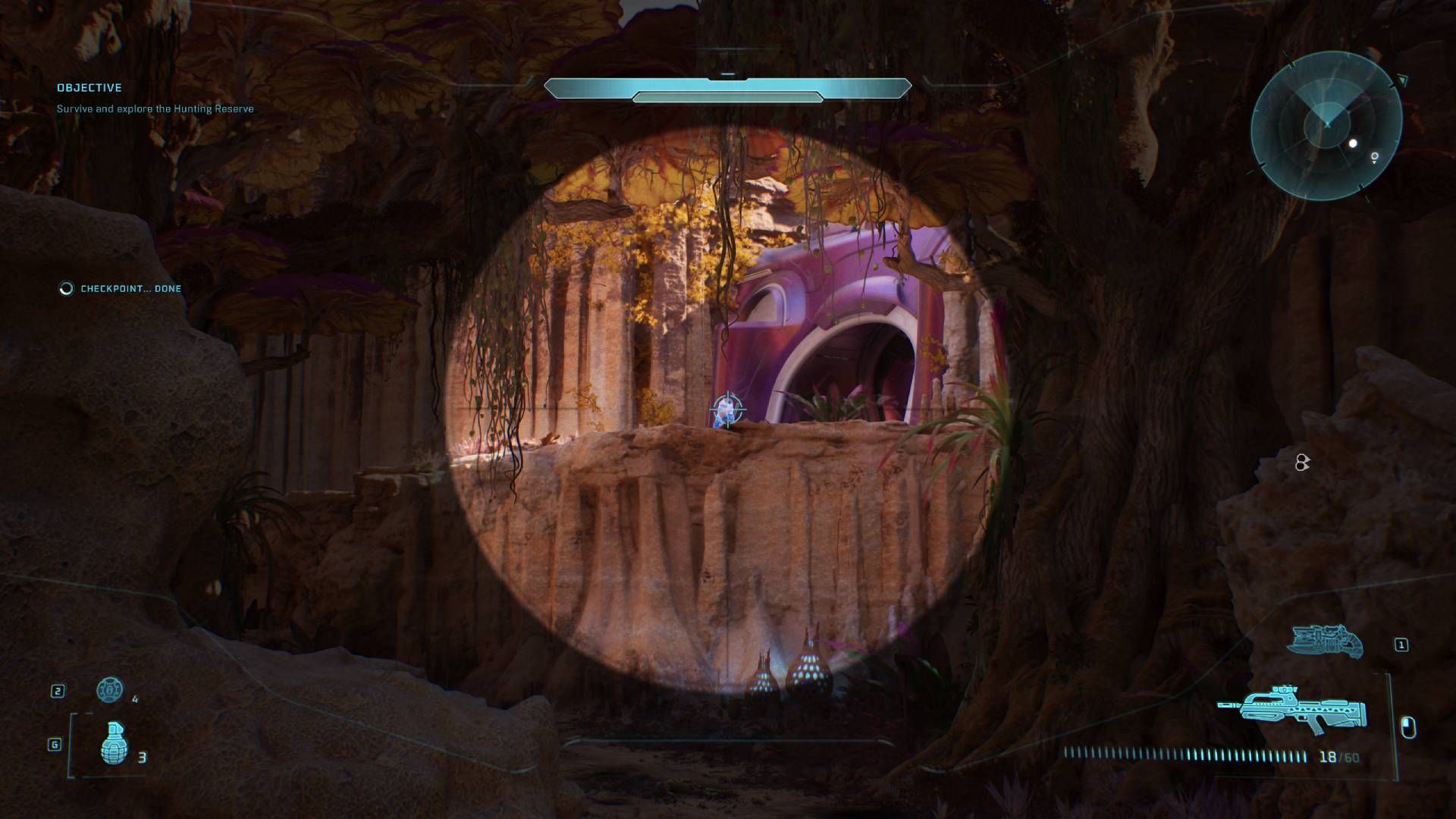The player in Halo: Campaign Evolved aiming down the sights at the invincible elite.