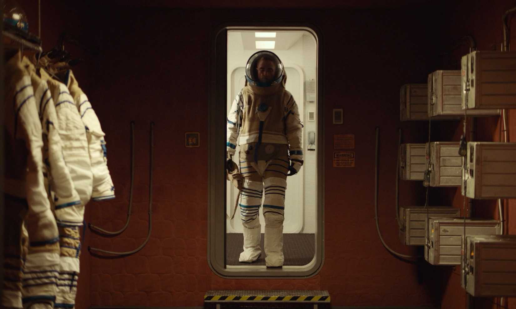 Monte suits up and navigates the spaceship in High Life