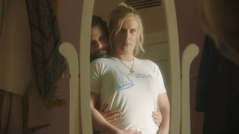 Eric Rahill and John Early standing in front of a mirror in Maddie's Secret