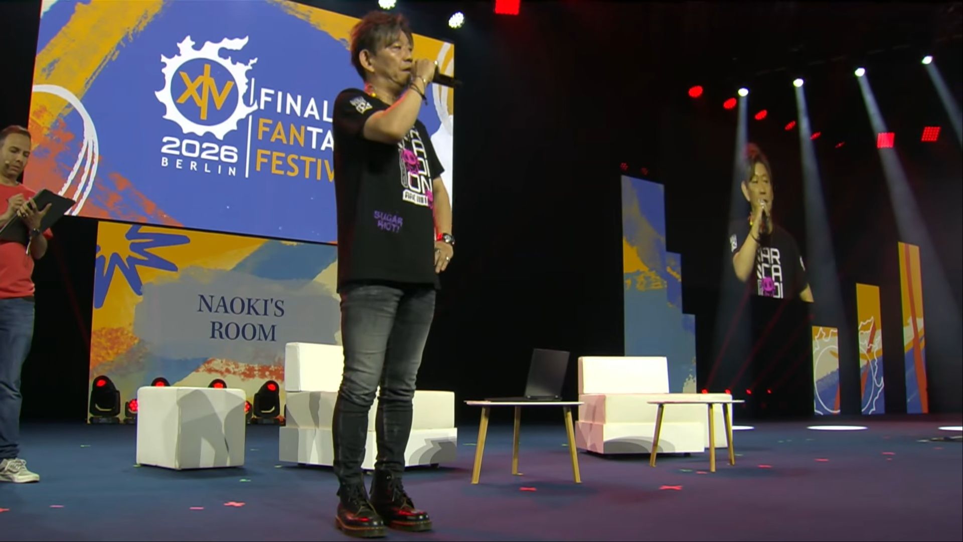 yoshida talking at naoki's room panel