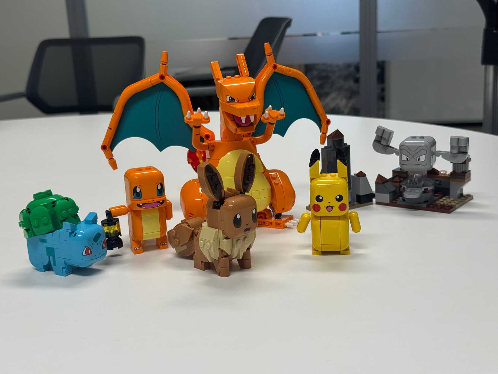 Pokemon Smart Play Legos sit on a table.