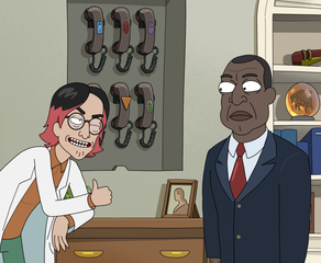 A guy wearing a lab coat winks at President Curtis and gives him the thumbs up while leaning on a desk near a rack of phones with odd logos.