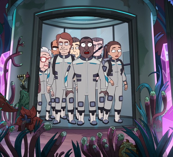 President Curtis, Banks, O'Doyle and others wearing explorer suits stand in an elevator looking at a subterranean w
