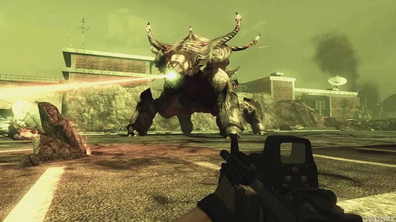 The player in BlackSite: Area 51 with a huge alien in front of them.