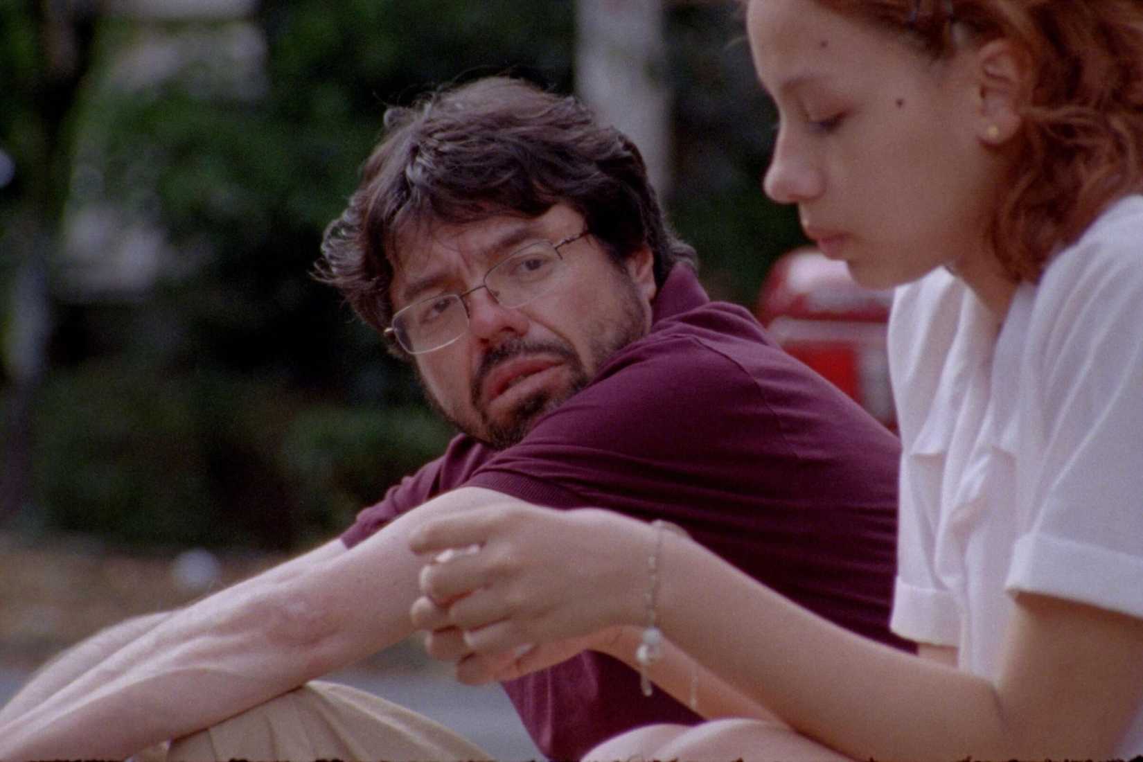 A man and a young woman talking in 'A Poet'
