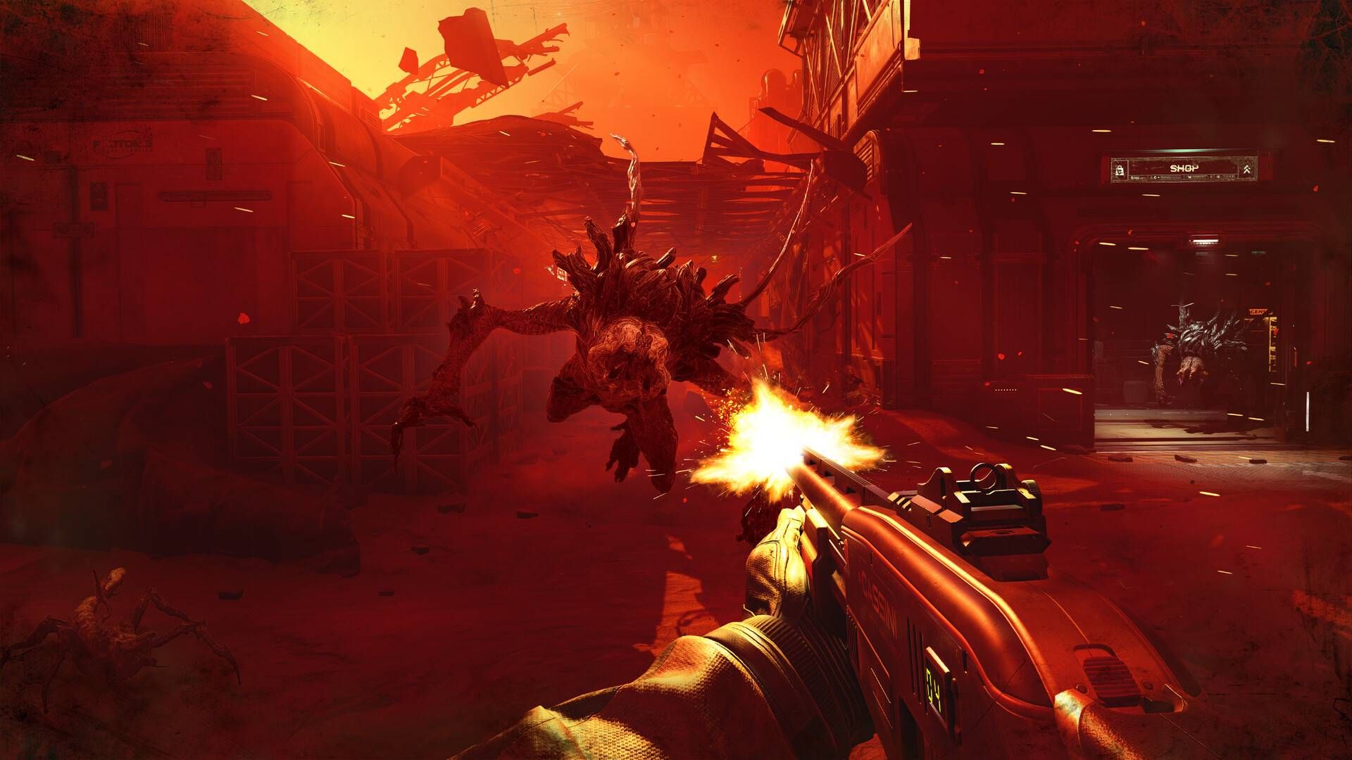 The player in Alien Deathstorm firing a gun at an alien leaping at them.