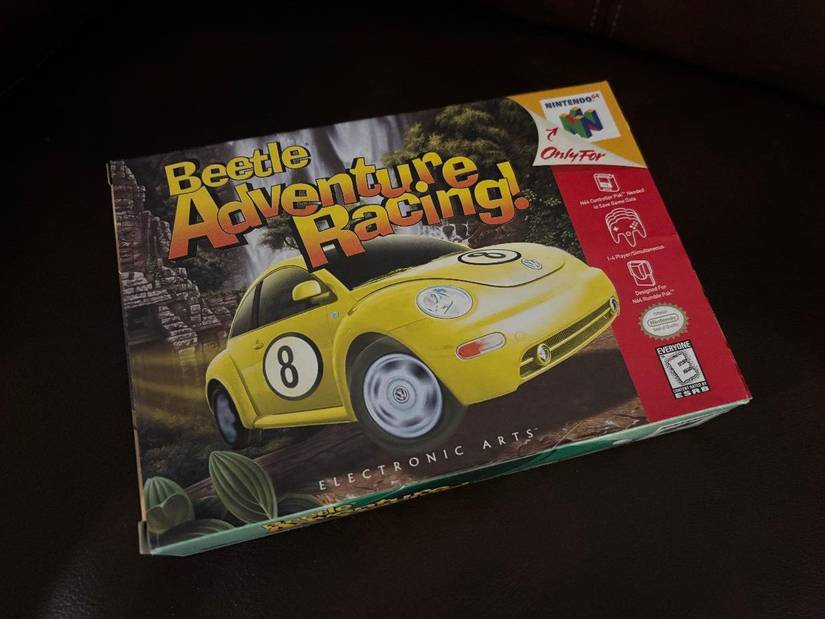 The exterior packaging for Beetle Adventure Racing on Nintendo 64, against a faux leather backdrop.