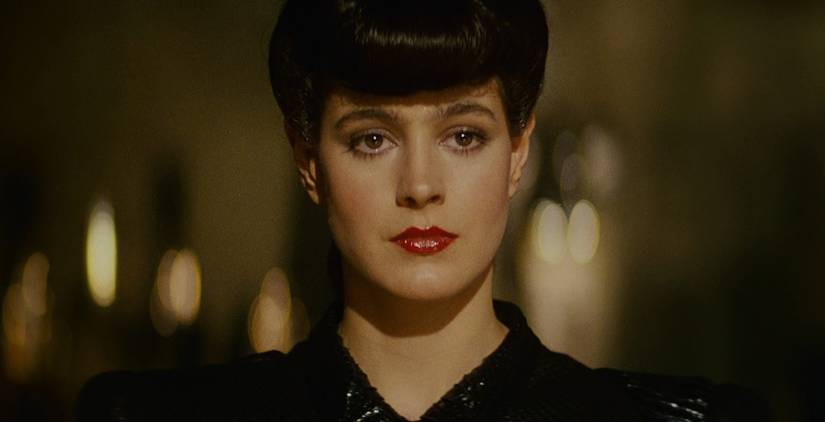 Rachael looks at Deckard during their first meeting in Blade Runner