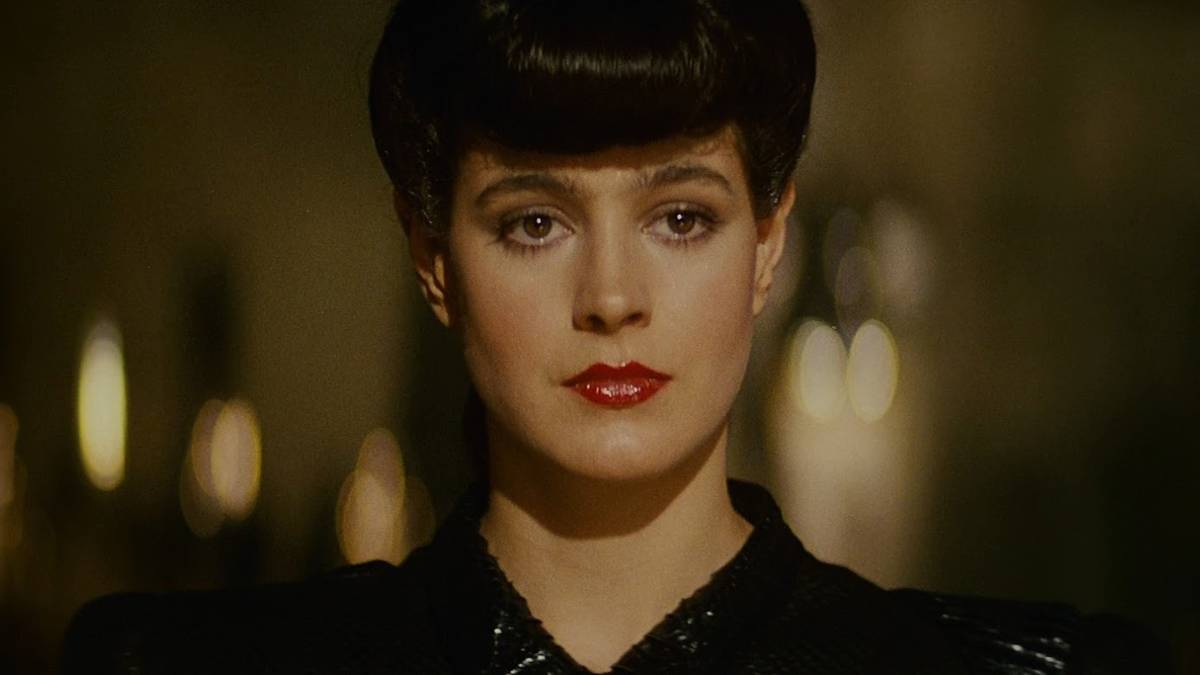 Rachael looks at Deckard during their first meeting in Blade Runner