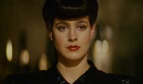 Rachael looks at Deckard during their first meeting in Blade Runner