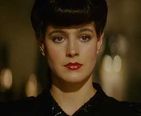 Rachael looks at Deckard during their first meeting in Blade Runner