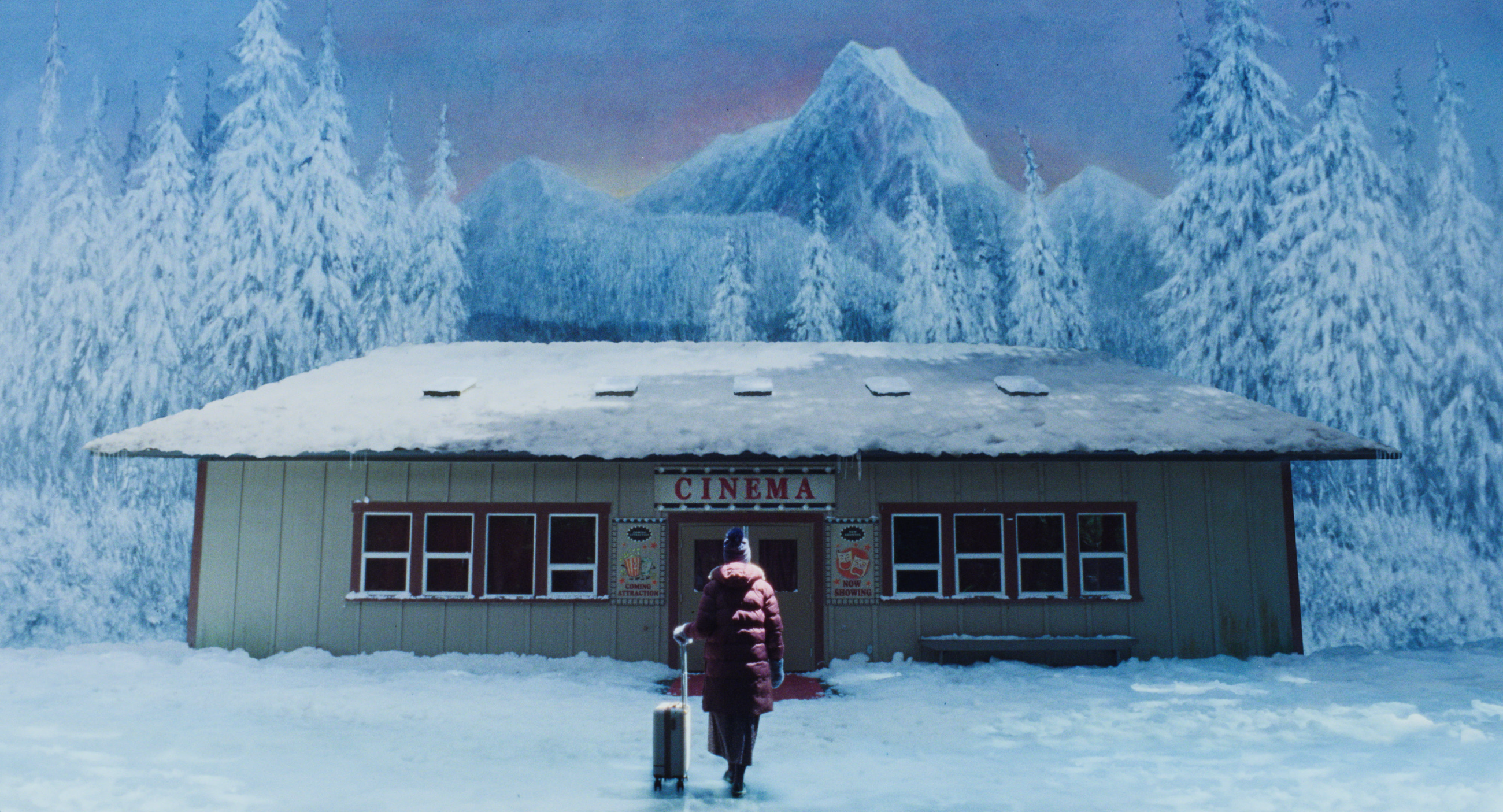 A woman in a snowy landscape walking inside a theater in Teenage Sex and Death at Camp Miasma still