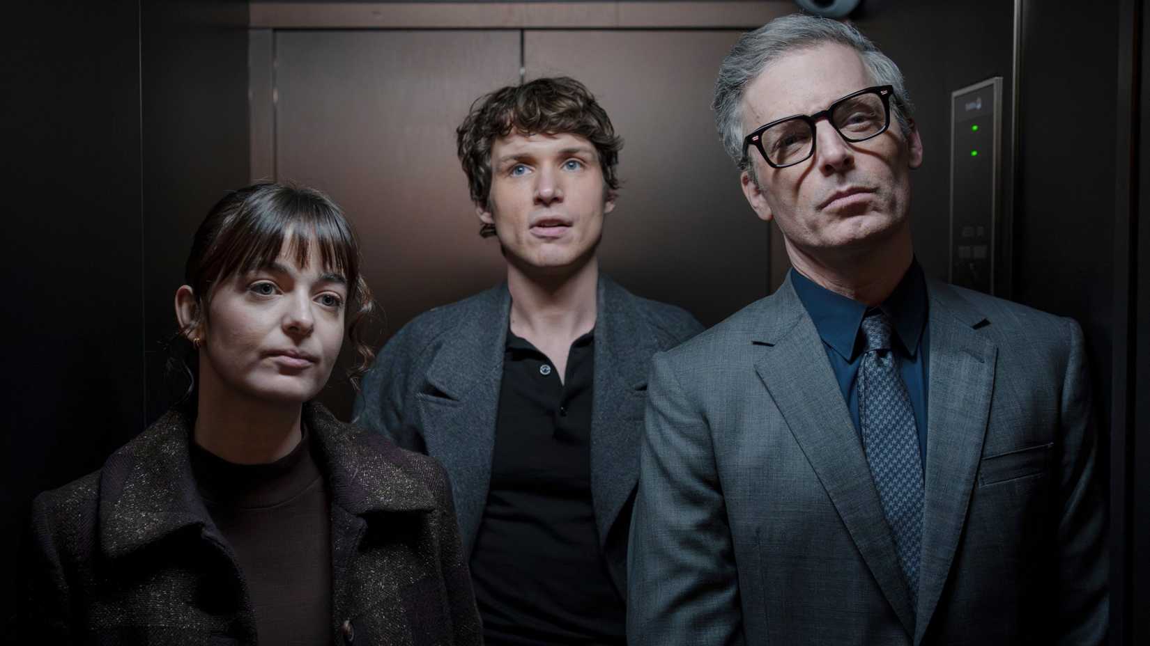 Doris (Celine Buckens), Guy Anatole (Nicholas Denton) and  Raglan Jones (Justin Kirk) stand in an elevator in Talamasca the Secret Order