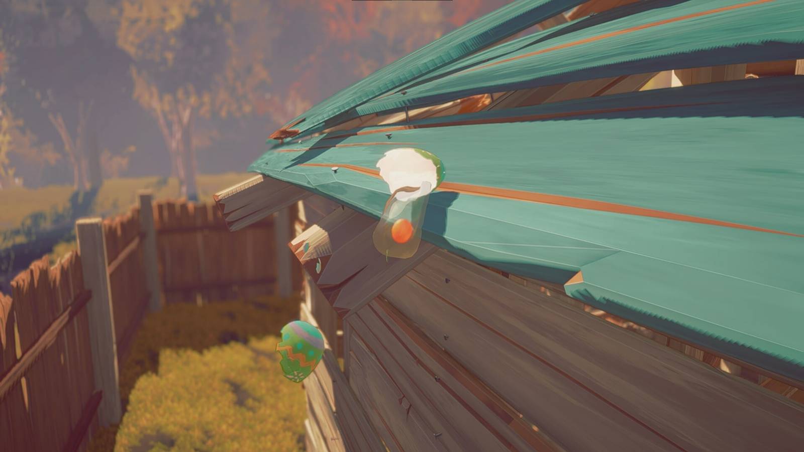 A broken egg on a teal roof. 