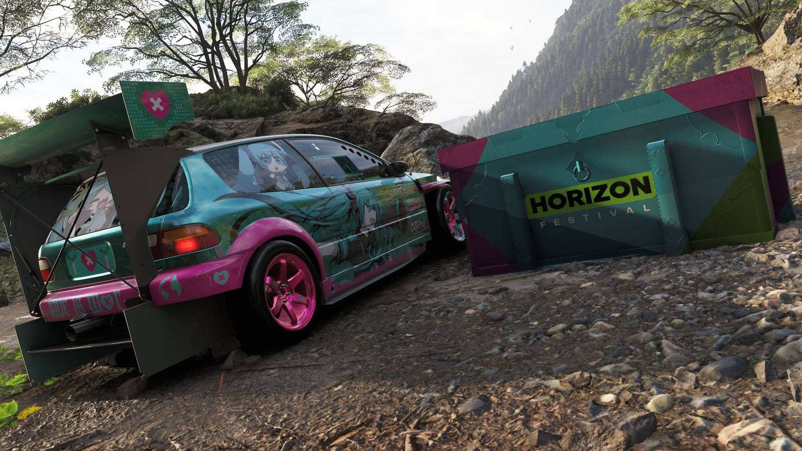 A car beside a colorful box with the words 