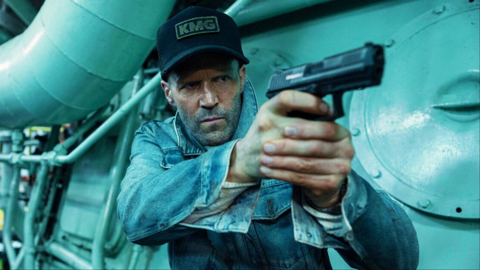 jason statham's character cole reed holding pistol