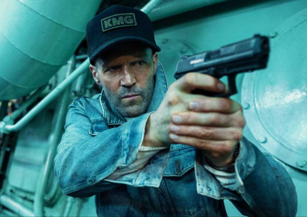 jason statham's character cole reed holding pistol