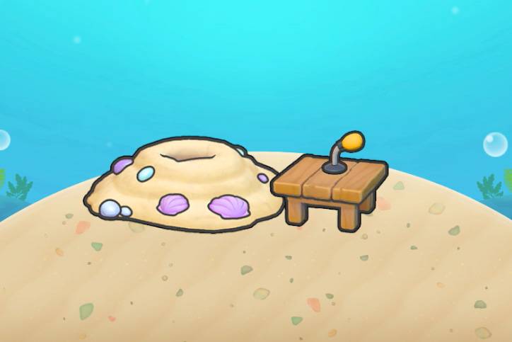 A pile of sand next to a table with a small microphone on it in Pokopia