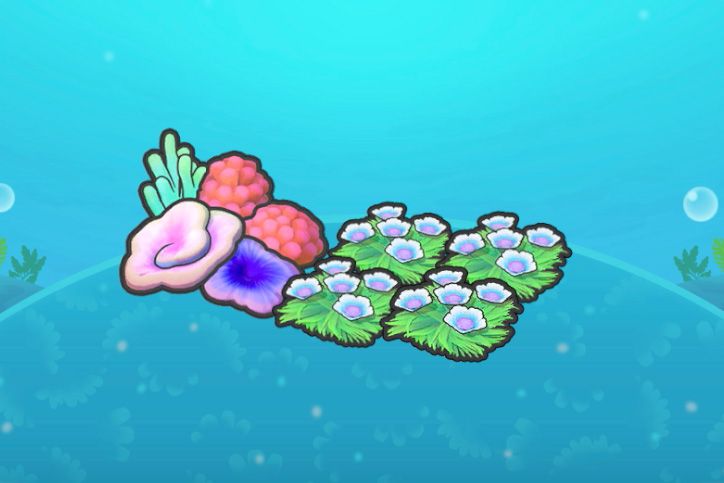 Four flower patches by a large chunk of colorful coral in Pokopia