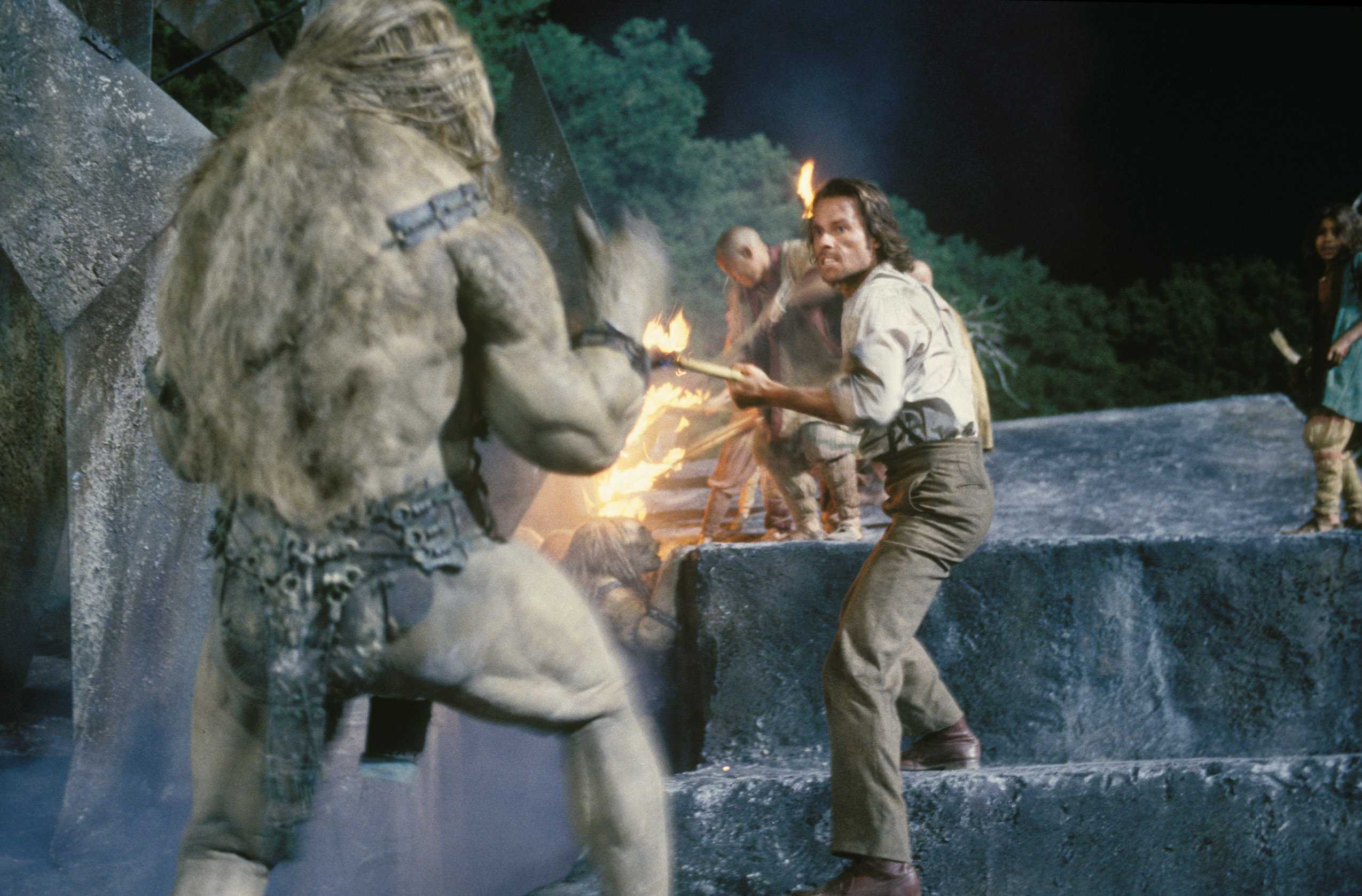 guy pierce fends off a morlock in the time machine (2002)