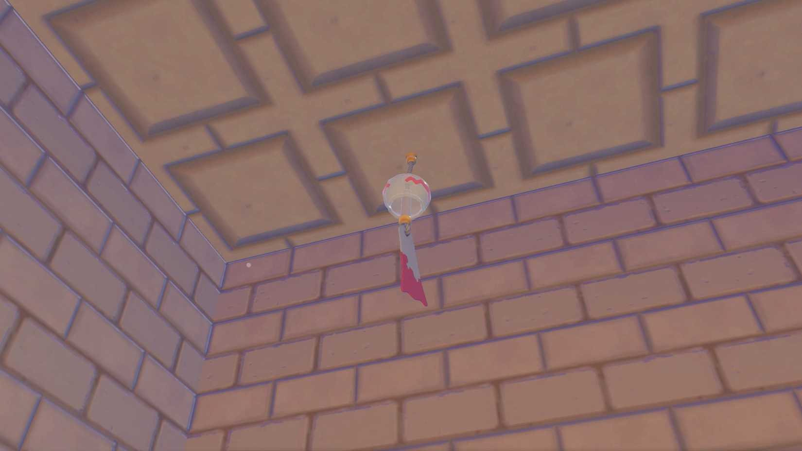 A Chimecho wind chime hanging from the ceiling in Pokopia