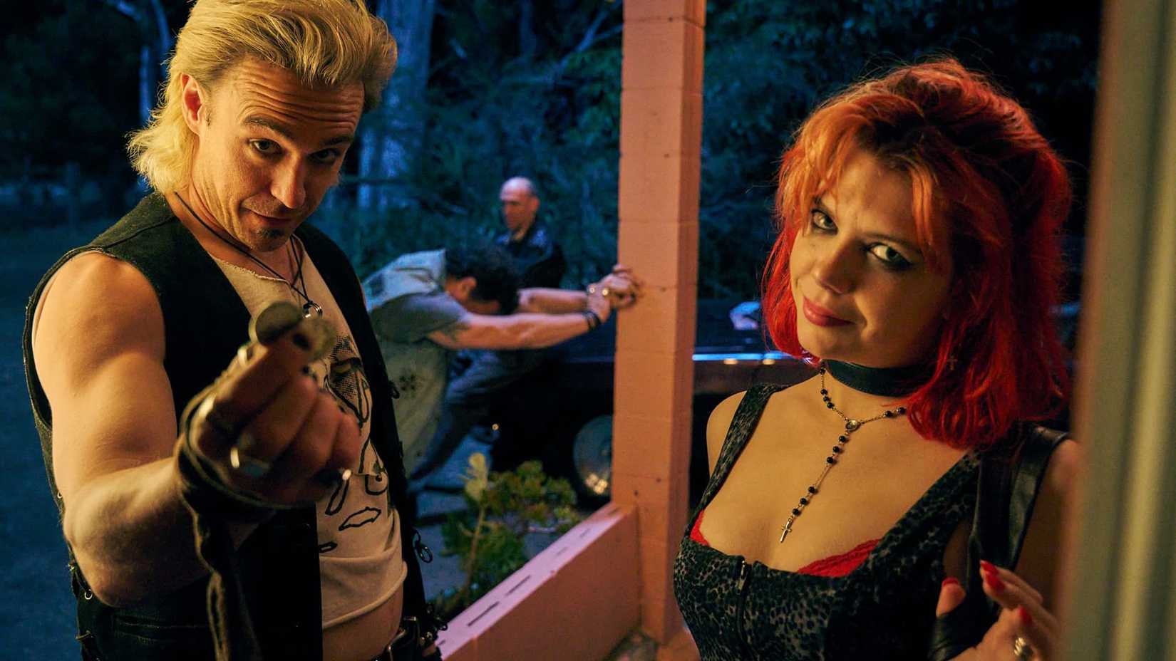 A man and a woman wearing punk outifts in Penny Lane Is Dead