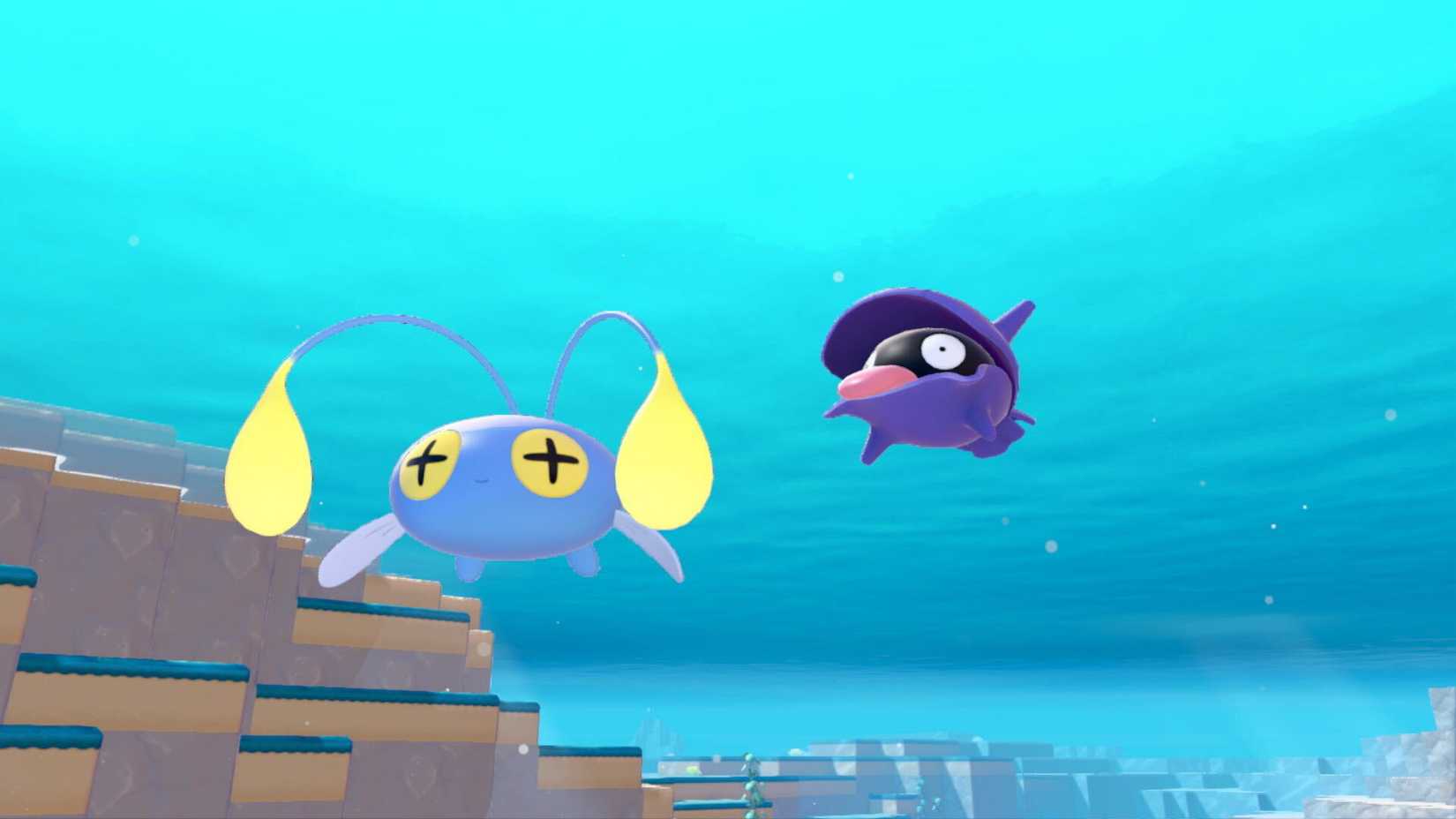 Shellder and Chinchou float underwater in Pokemon Pokopia.