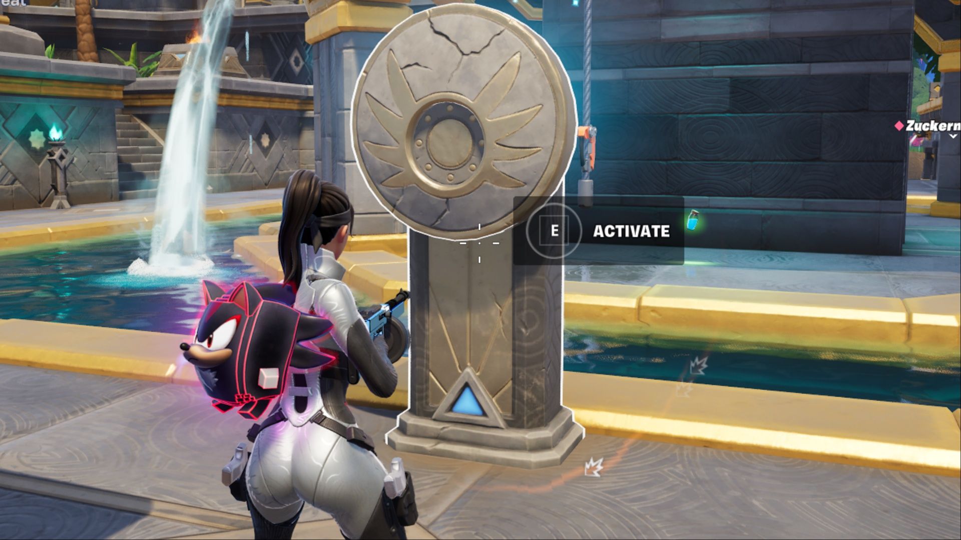 Inserting a vault key into the stone pillar mechanism