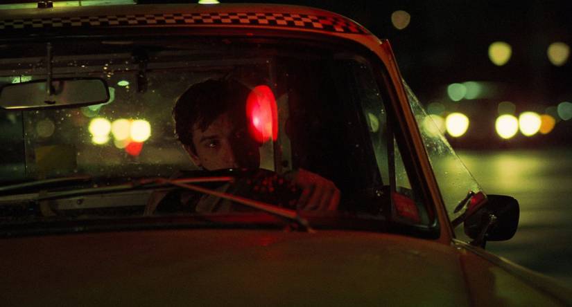Travis watches the city like a vigilante in Taxi Driver