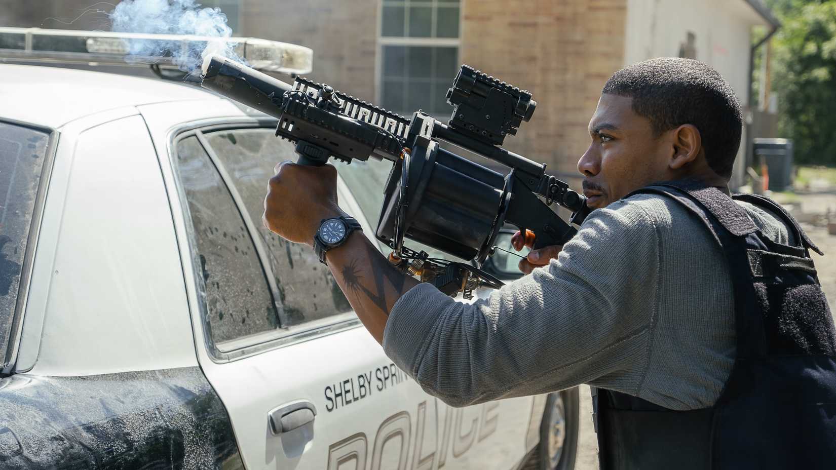 Terry Richmond (Aaron Pierre) holds a grenade gun in Rebel Ridge