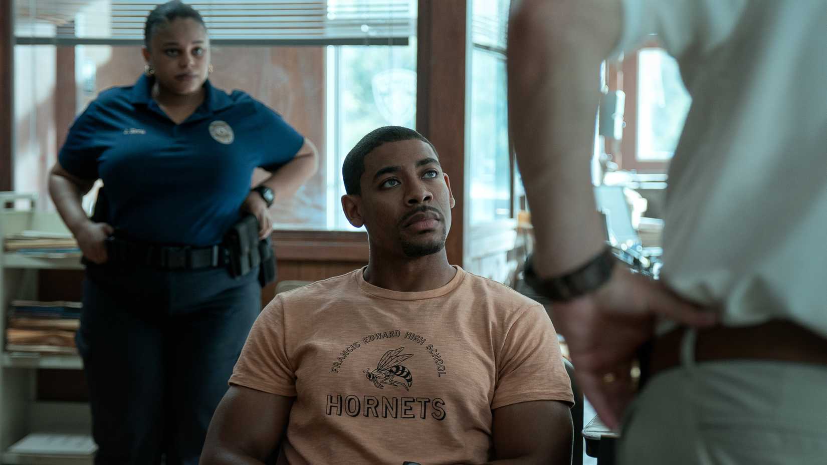 Terry Richmond (Aaron Pierre) sits in a police station in Rebel Ridge
