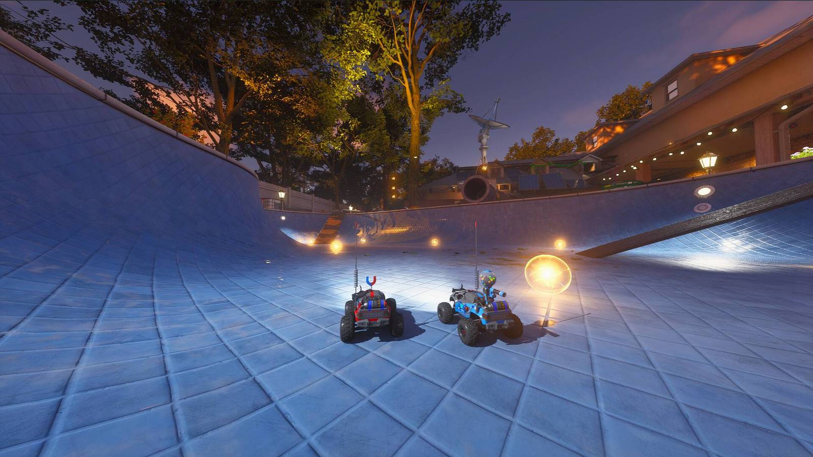 Two cars in WheelMates at the bottom of a swimming pool.
