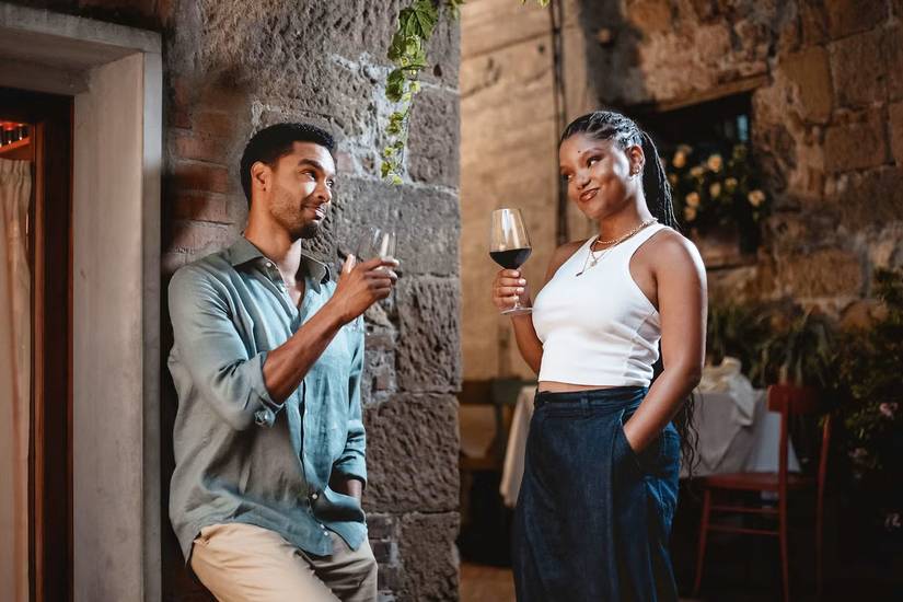 A man and a woman drinking wine in 'You, Me & Tuscany)