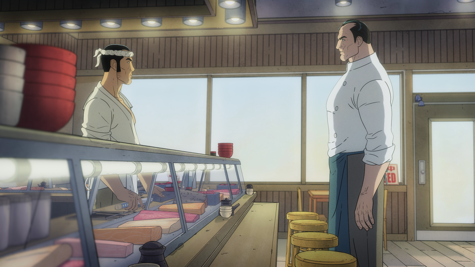 Bob stands at Jiro's sushi counter in Get Jiro