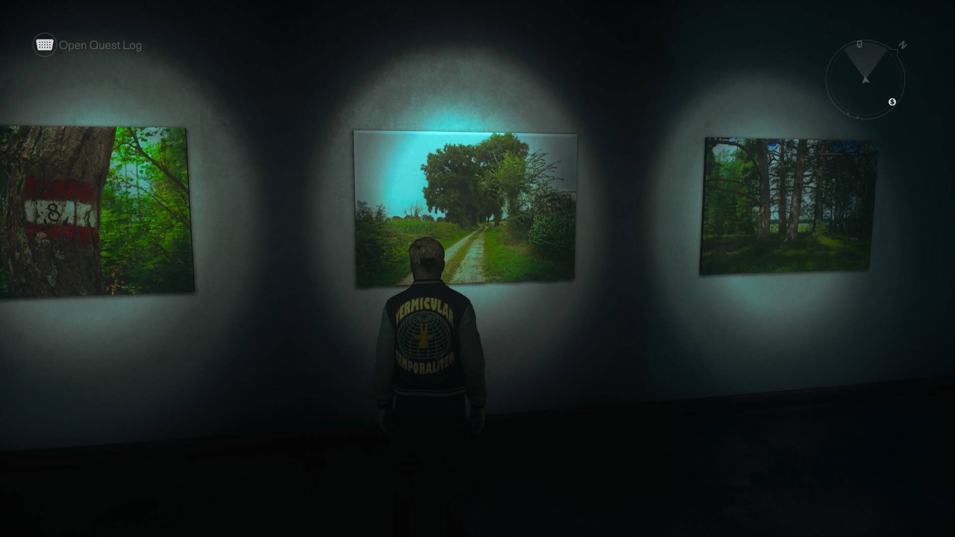 Dylan standing in front of the journey artwork in Control Resonant.