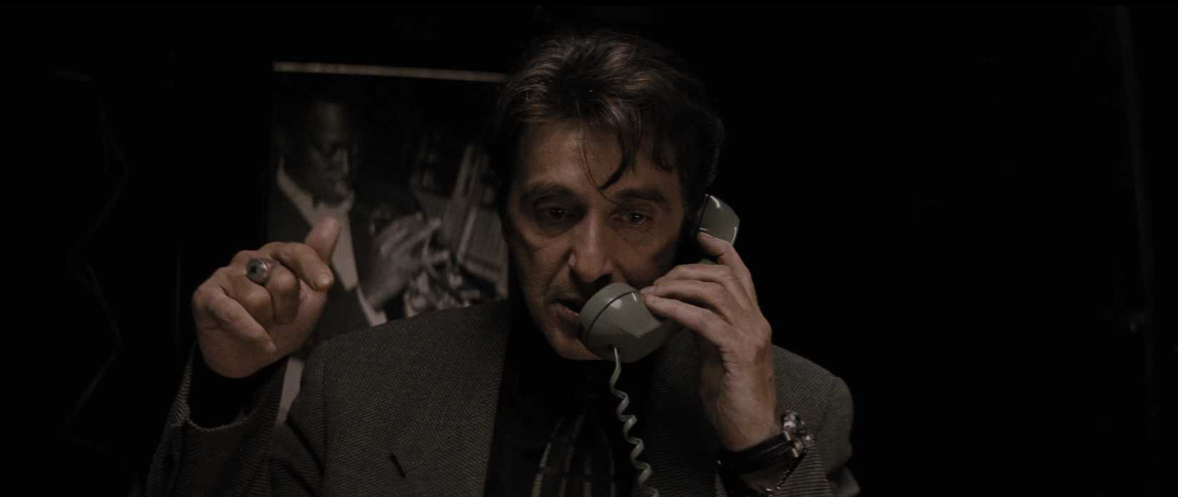 Vincent Hanna speaks to someone on call in Heat