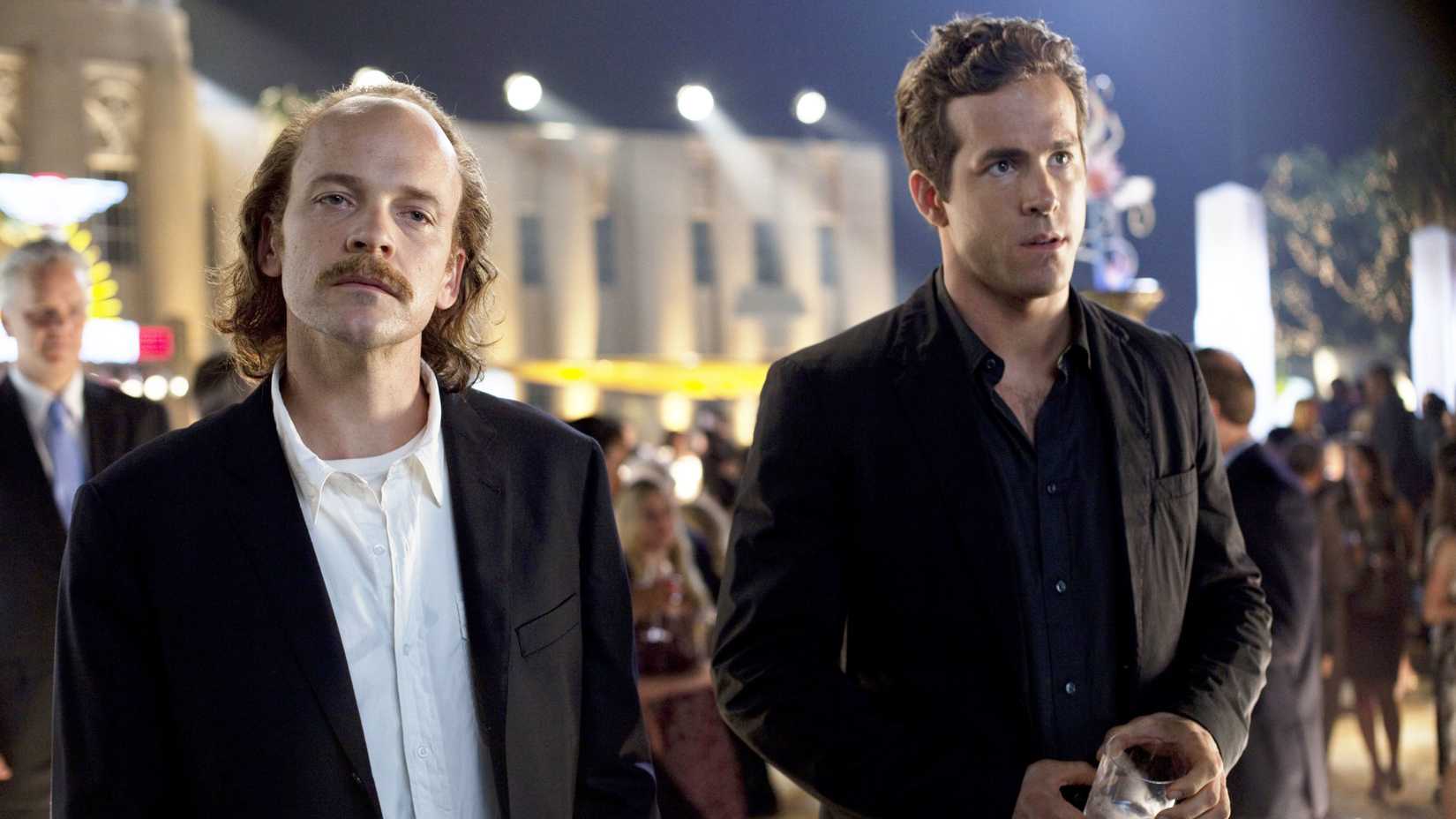 Hector Hammond (Peter Sarsgaard) and Hal Jordan (Ryan Reynolds) in Green Lantern