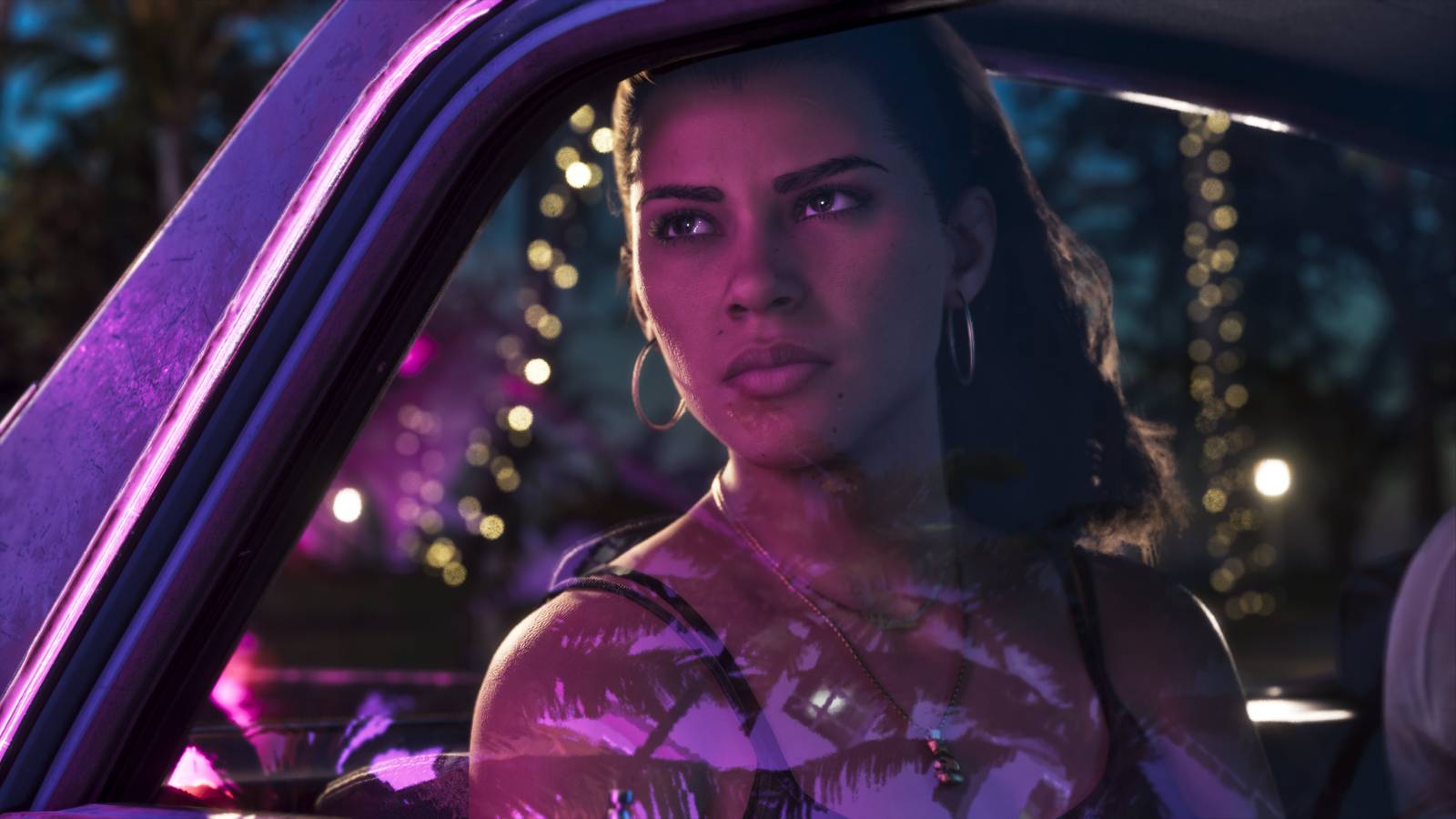 Lucia stares out of a car window