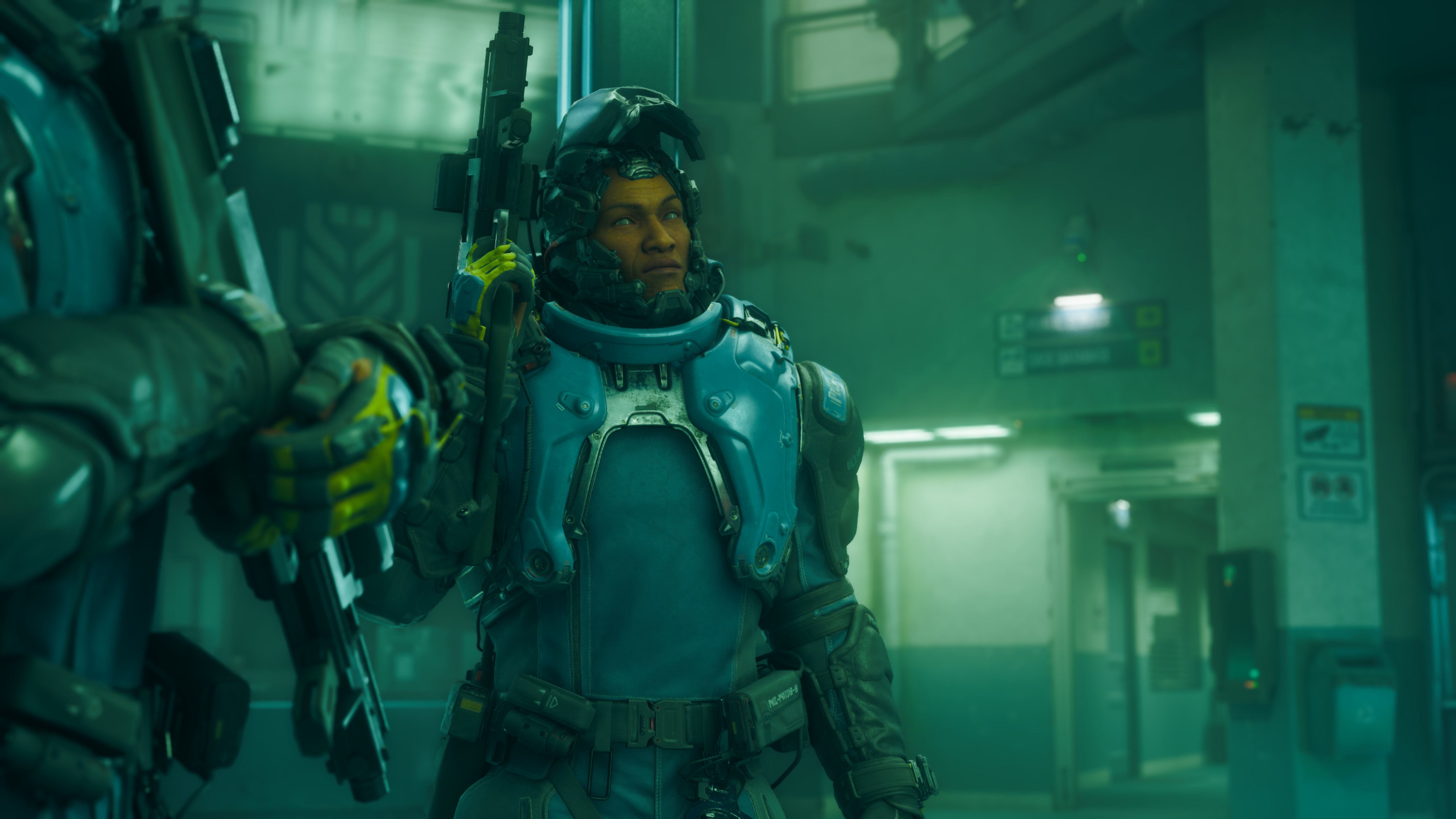 A guy in a mech suit holds a gun in No Law