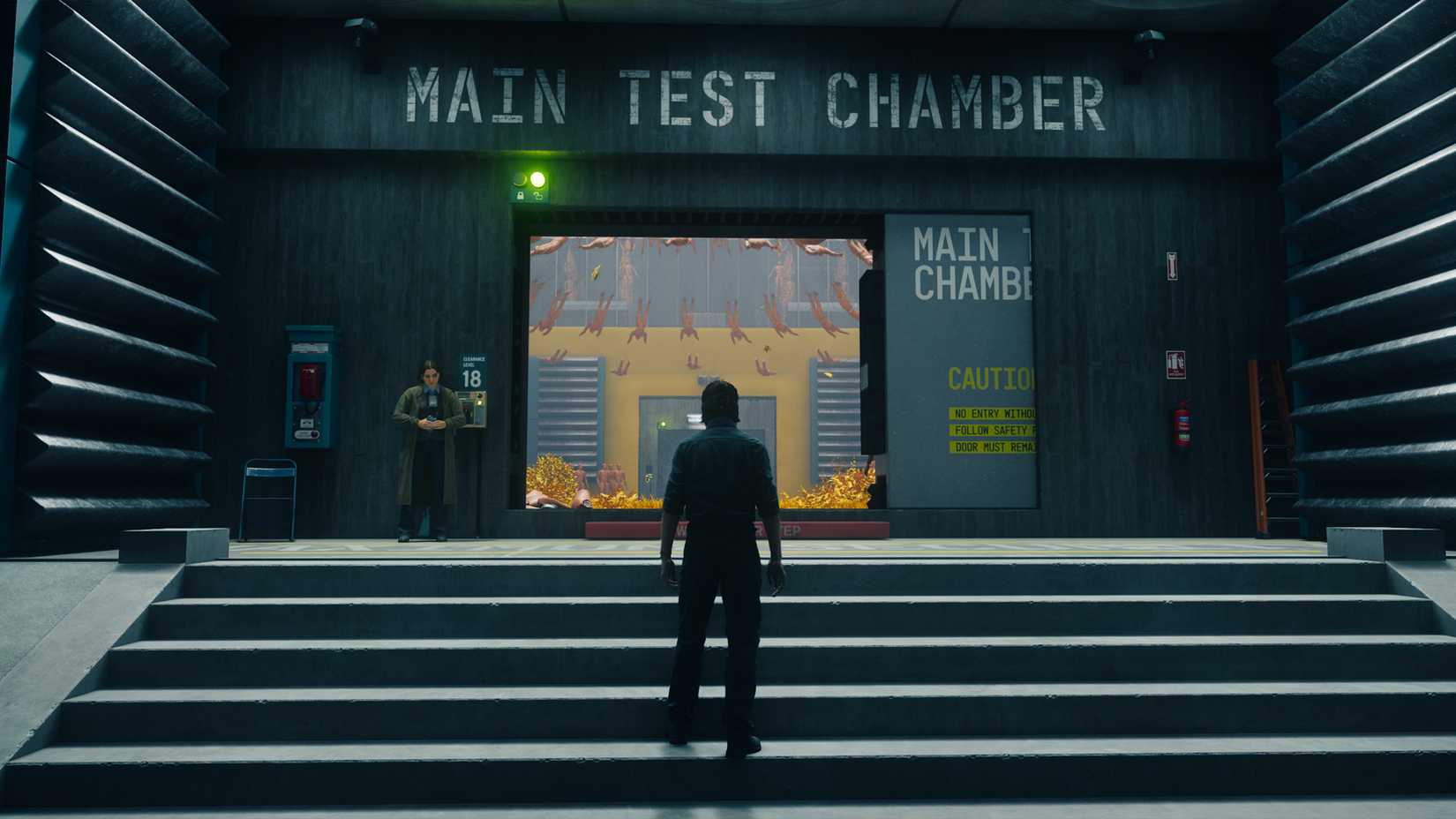 Dylan standing in front of the entrance to the main test chamber in Control Resonant.